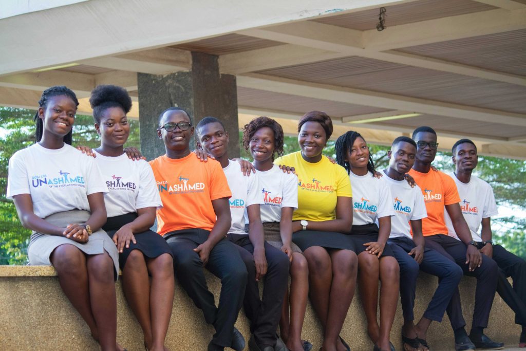 Youth group in matching shirts at a mentorship gathering