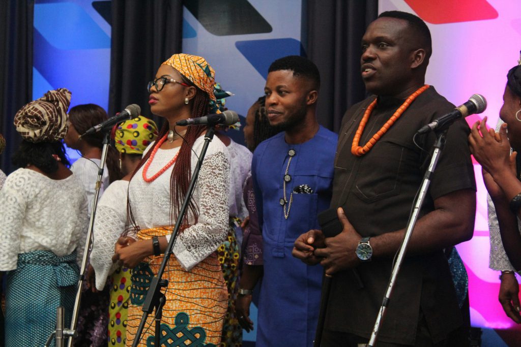 A choir leading worship in song