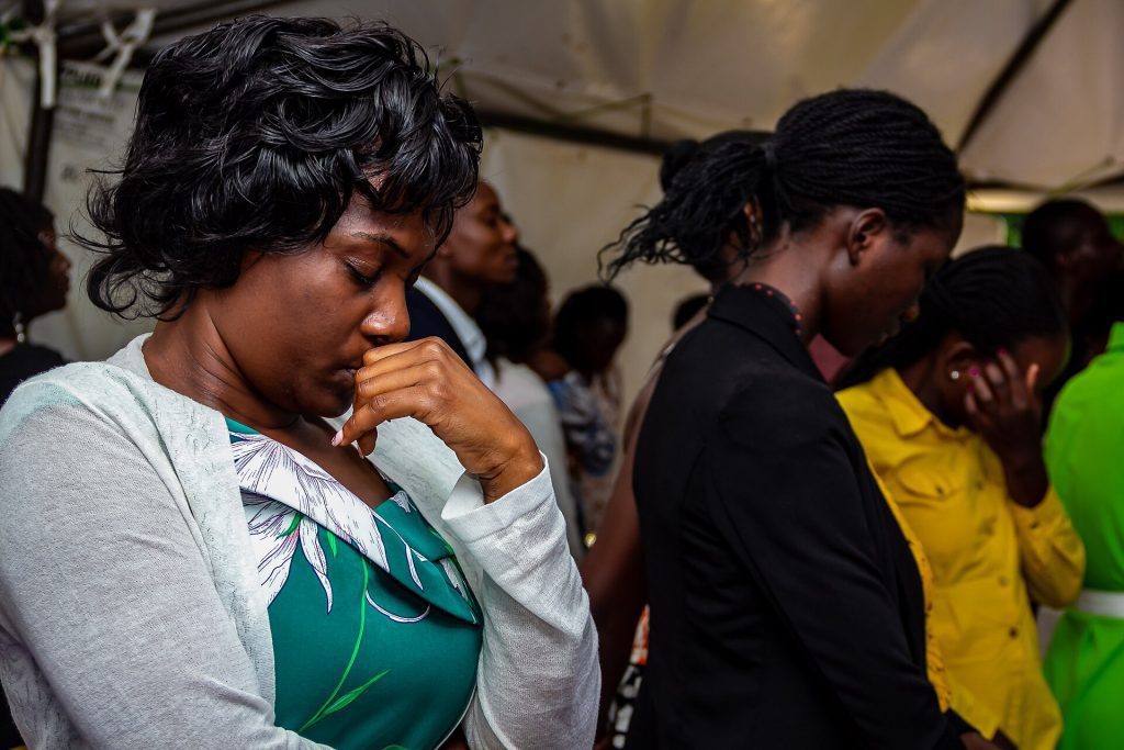 People joined in prayer