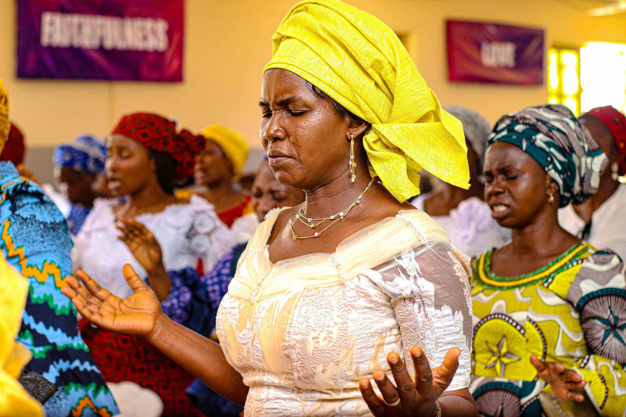 Women in traditional dress at a community celebration