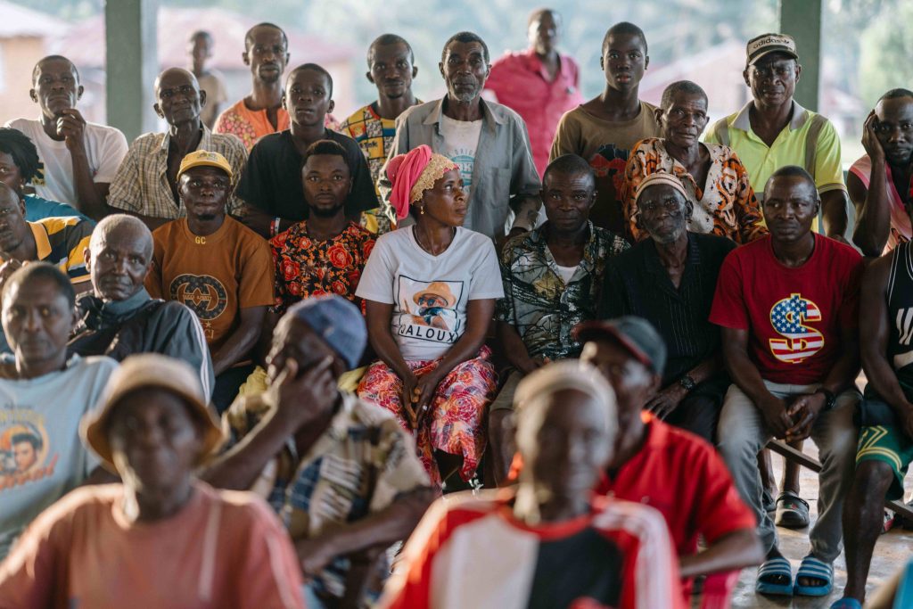 Neighbours gathered at a community outreach meeting